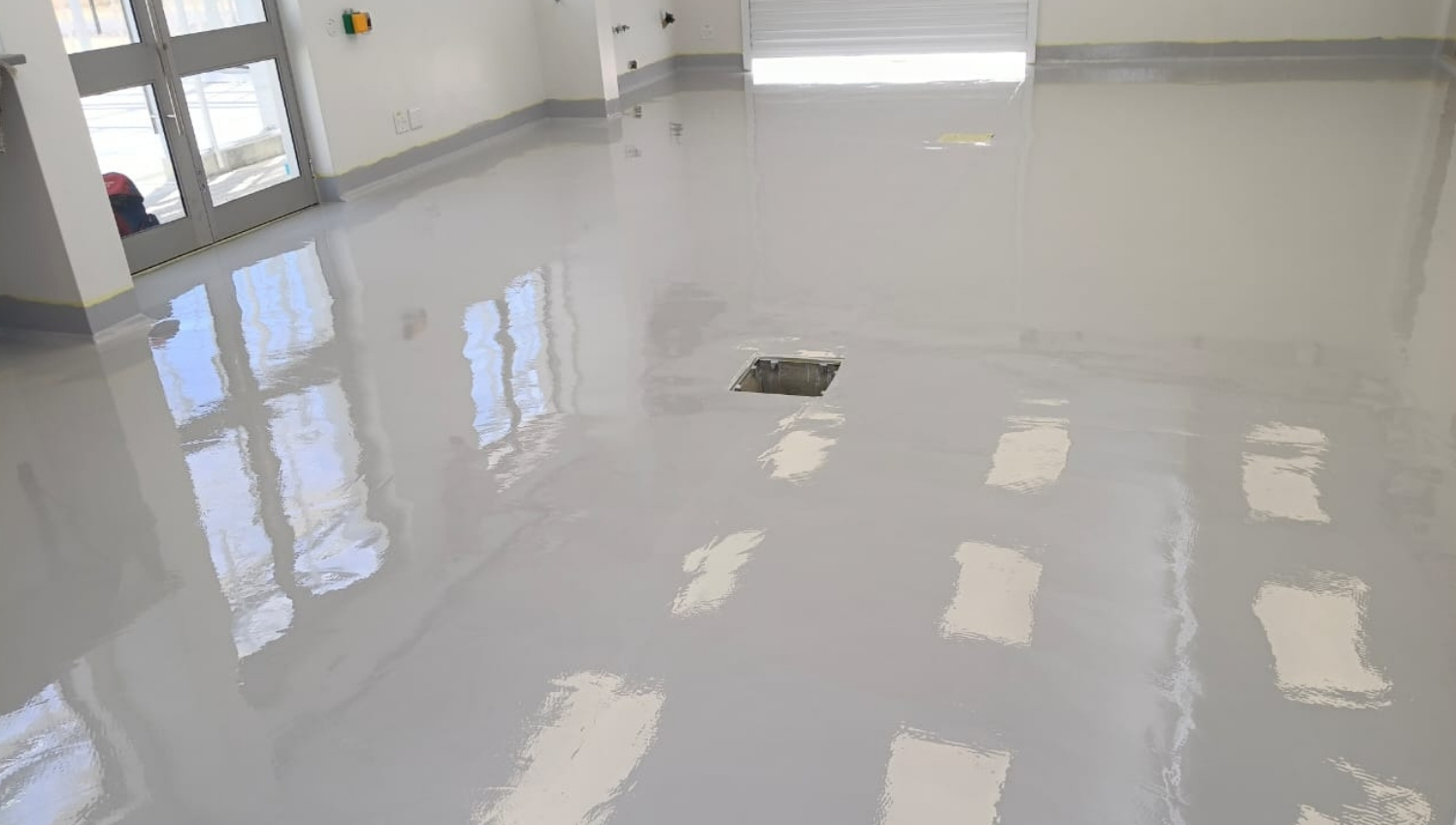 White epoxy floor. High build epoxy flooring.