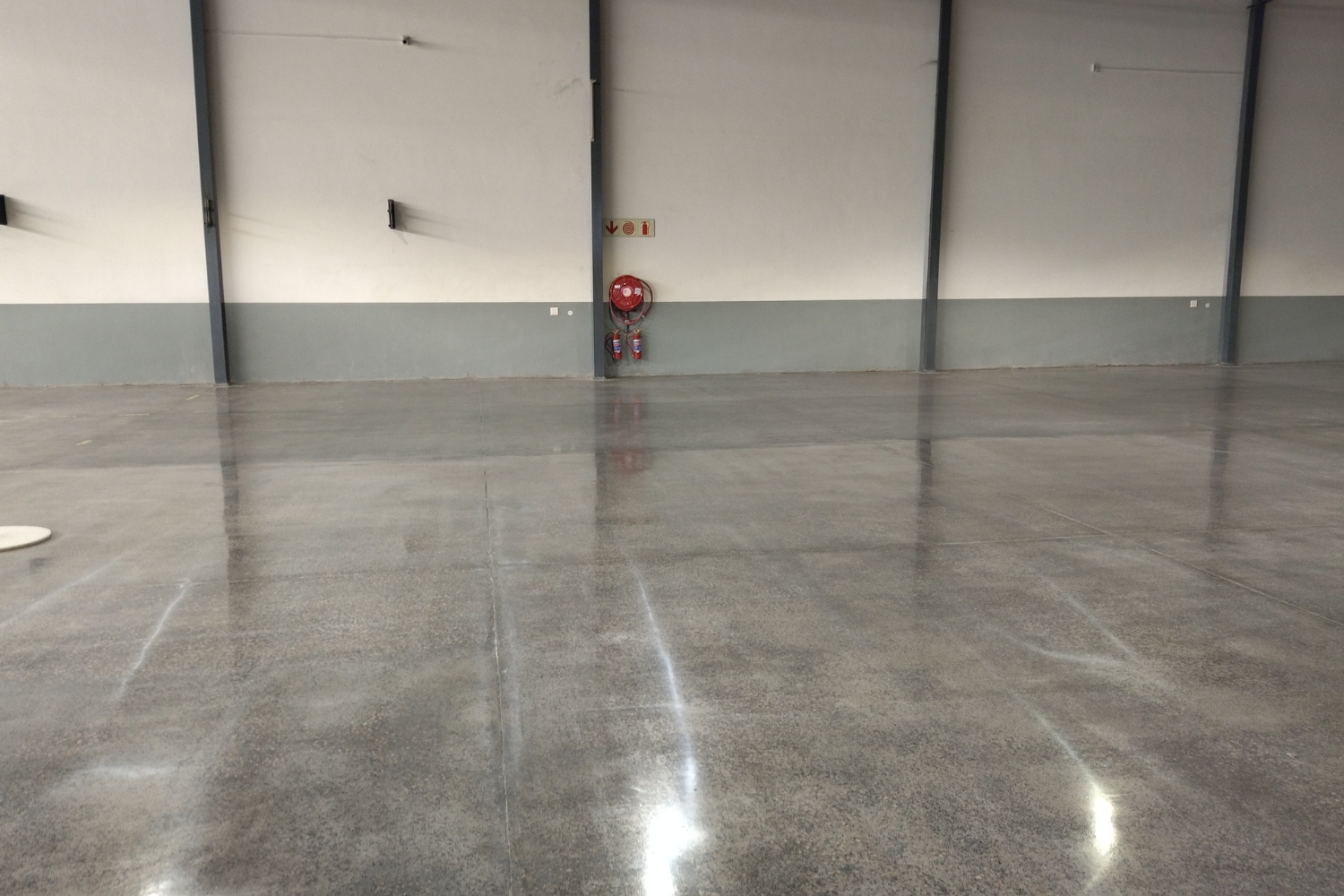 Warehouse floor finished with epoxy MM Combo and burnished.